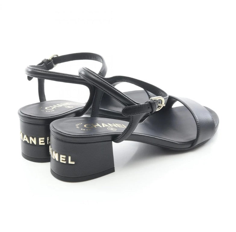 Pre-owned CHANEL Logo heel Sandals Leather Black